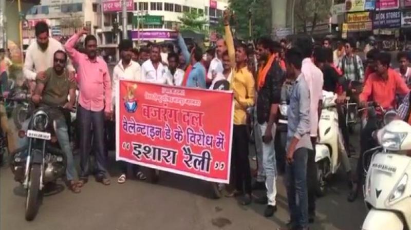 A day ahead of Valentine's Day, posters with messages like 'Say no to Valentine's Day' and 'Love Jihad: Hindu girls beware' were witnessed in Gujarat's Ahmedabad. (Photo: ANI) A day ahead of Valentine's Day, posters with messages like 'Say no to Valentine's Day' and 'Love Jihad: Hindu girls beware' were witnessed in Gujarat's Ahmedabad. (Photo: ANI)