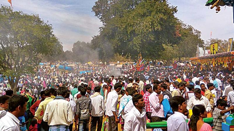 Hundreds of people thronged the Beladakuppe Madeshwara temple in the heart of Bandipur Reserve Forest for a fair on Monday Hundreds of people thronged the Beladakuppe Madeshwara temple in the heart of Bandipur Reserve Forest for a fair on Monday