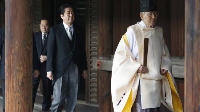 The shrine honours millions of Japanese war dead, but also senior military and political figures convicted of war crimes after World War II. (Photo: AP/File) The shrine honours millions of Japanese war dead, but also senior military and political figures convicted of war crimes after World War II. (Photo: AP/File)