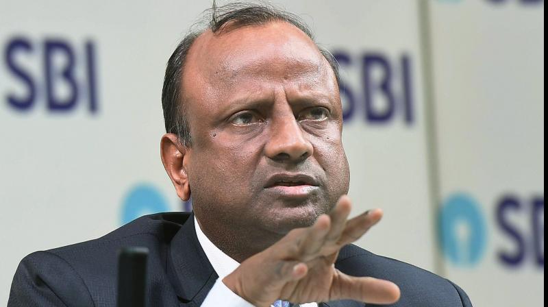 SBI chairperson Rajnish Kumar. State bank of India approved a further investment of upto 17.60 billion rupees in public offering of Yes Bank. (PTI Photo)