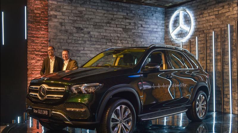 Daimler, the maker of Mercedes-Benz luxury cars and Freightliner trucks, lost 1.91 billion euros in the second quarter. (AFP Photo)