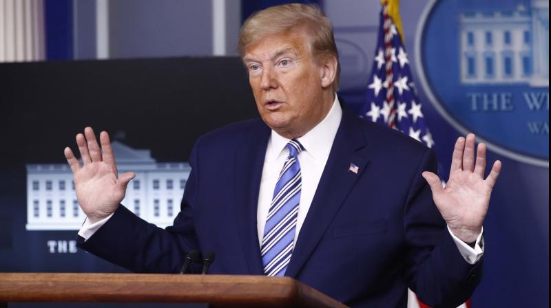 Trump abruptly escorted from briefing after shooting near White House. (PTI Photo) Trump abruptly escorted from briefing after shooting near White House. (PTI Photo)