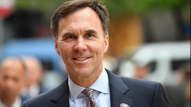 Canadas finance minister Bill Morneau announced his resignation Monday. (AFP Photo)