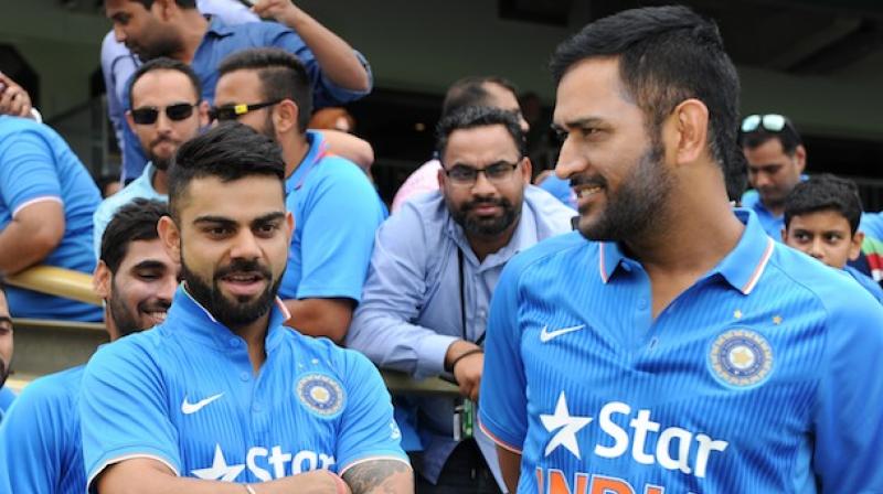 I have already started using him (Kohli) more. If you witness a match you will see I have more interactions with him on the field because two individuals of course will conduct in different ways, said MS Dhoni on Virat Kohli. (Photo: AFP) I have already started using him (Kohli) more. If you witness a match you will see I have more interactions with him on the field because two individuals of course will conduct in different ways, said MS Dhoni on Virat Kohli. (Photo: AFP)