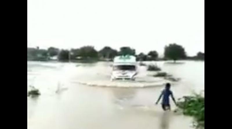 The young boy, identified as Venkatesh, a Class 6 student from a local government school, was reportedly playing on the banks of the stream, when the ambulance driver approached him for help. (Photo: video screengrab) The young boy, identified as Venkatesh, a Class 6 student from a local government school, was reportedly playing on the banks of the stream, when the ambulance driver approached him for help. (Photo: video screengrab)