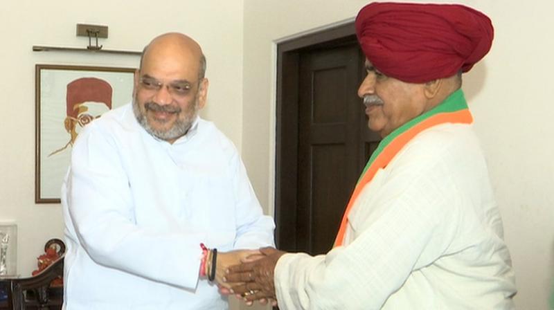 Javadekar said Bainsla had also met party president Amit Shah in the morning. (Image: ANI) Javadekar said Bainsla had also met party president Amit Shah in the morning. (Image: ANI)