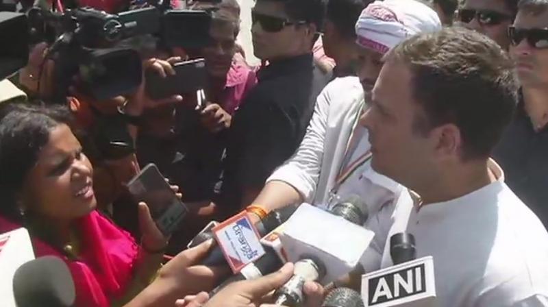 Mr Gandhi also wondered why Mr Modi and Ms Banerjee did not provide loan waiver to the farmers. (Image: ani) Mr Gandhi also wondered why Mr Modi and Ms Banerjee did not provide loan waiver to the farmers. (Image: ani)