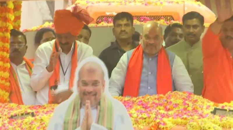 Accompanying Shah were Yelahanka MLA S R Vishwanath and BJP national general secretary and Karnataka in charge P Muralidhar Rao. (Image: ANI) Accompanying Shah were Yelahanka MLA S R Vishwanath and BJP national general secretary and Karnataka in charge P Muralidhar Rao. (Image: ANI)