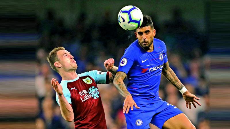 Burnley’s Ashley Barnes (left) vies for the ball with Emerson of Chelsea in their Premier League match at Stamford Bridge in London on Monday. (Photo: AP) Burnley’s Ashley Barnes (left) vies for the ball with Emerson of Chelsea in their Premier League match at Stamford Bridge in London on Monday. (Photo: AP)