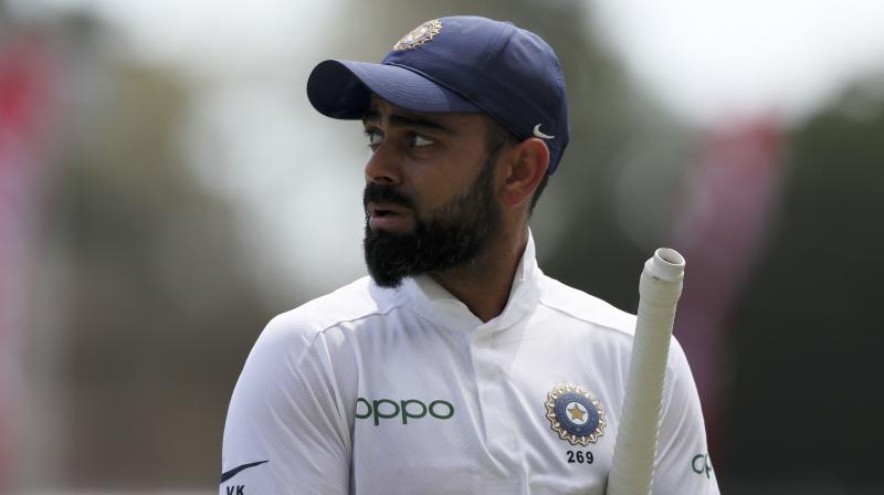 Kohli brought up his half-century in the 55th over of the innings, and he along with Rahane ensured the team does not lose any more wicket before the tea break. (Photo: AP) Kohli brought up his half-century in the 55th over of the innings, and he along with Rahane ensured the team does not lose any more wicket before the tea break. (Photo: AP)
