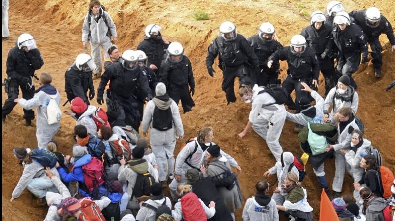 Riot police scuffled with some of the demonstrators but there were no major incidents reported. Photo: AP Riot police scuffled with some of the demonstrators but there were no major incidents reported. Photo: AP