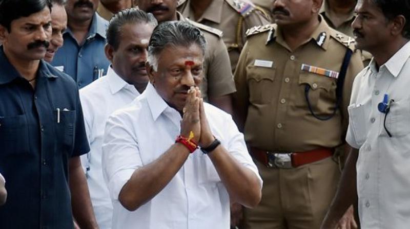 Former Chief Minister O Panneerselvam along with his supporting MLAs after the vote of confidence motion moved by chief minister Edappadi K Palanisamy passed under tumultous circumstances in the House, at State Secretariat in Chennai on Saturday. (Photo: PTI) Former Chief Minister O Panneerselvam along with his supporting MLAs after the vote of confidence motion moved by chief minister Edappadi K Palanisamy passed under tumultous circumstances in the House, at State Secretariat in Chennai on Saturday. (Photo: PTI)
