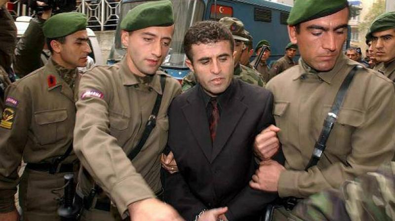 Daimi Akyuz (centre), the man who killed a 2-year-old child, in an undated photo. (Photo: Facebook) Daimi Akyuz (centre), the man who killed a 2-year-old child, in an undated photo. (Photo: Facebook)