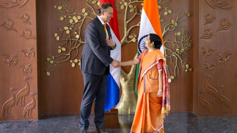 Indian Foreign Minister Sushma Swaraj, right, shakes hand with her Dutch counterpart Bert Koenders in New Delhi, India, Tuesday, May 9, 2017. Koenders is on a four-day official visit to India. (Photo: AP) Indian Foreign Minister Sushma Swaraj, right, shakes hand with her Dutch counterpart Bert Koenders in New Delhi, India, Tuesday, May 9, 2017. Koenders is on a four-day official visit to India. (Photo: AP)