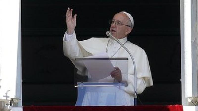 Pope Francis recites the Regina Coeli prayer from his studio's window overlooking St. Peter's Square at the Vatican, Sunday, May 28, 2017. (Photo: AP) Pope Francis recites the Regina Coeli prayer from his studio's window overlooking St. Peter's Square at the Vatican, Sunday, May 28, 2017. (Photo: AP)