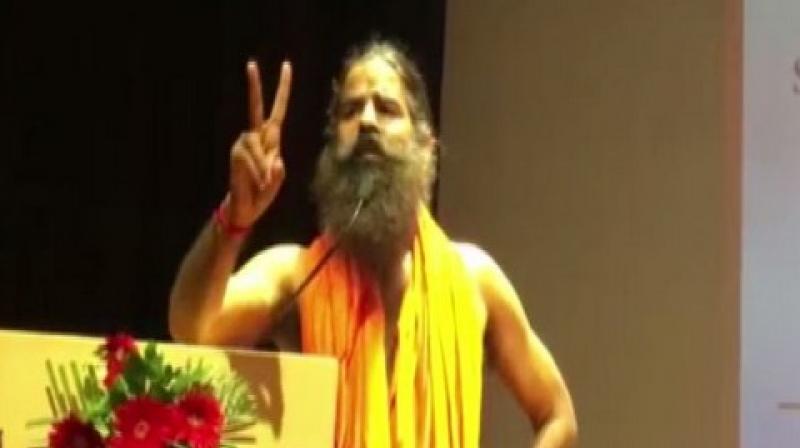 Ramdev further attacked Congress by claiming that former finance minister P Chidambaram had conspired to put Amit Shah in jail and their planning was to send Modi to gallows. (Photo: ANI) Ramdev further attacked Congress by claiming that former finance minister P Chidambaram had conspired to put Amit Shah in jail and their planning was to send Modi to gallows. (Photo: ANI)