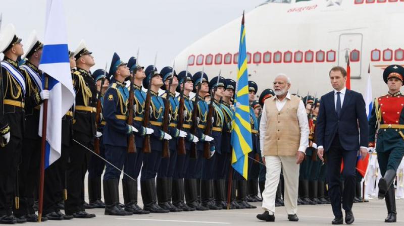 He received a guard of honour at the Vladivostok International Airport in the presence of Russia's Deputy Foreign Minister Igor Morgulov. (Photo: Twitter | @narendramodi) He received a guard of honour at the Vladivostok International Airport in the presence of Russia's Deputy Foreign Minister Igor Morgulov. (Photo: Twitter | @narendramodi)