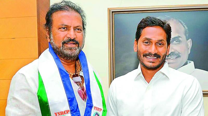 Actor M. Mohan Babu shakes hands with YSRC chief Y.S. Jagan Mohan Reddy after joining his party at Lotus Pond in Jubilee Hills on Tuesday. (Photo: Gandhi) Actor M. Mohan Babu shakes hands with YSRC chief Y.S. Jagan Mohan Reddy after joining his party at Lotus Pond in Jubilee Hills on Tuesday. (Photo: Gandhi)
