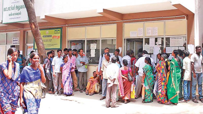 People waiting in queue to register at taluk office in Pallavaram. (Photo: DC) People waiting in queue to register at taluk office in Pallavaram. (Photo: DC)