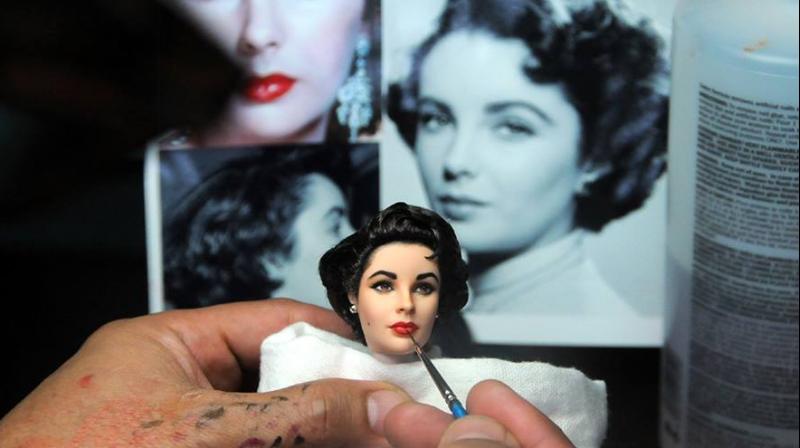 Noel custom repainting Mattel Elizabeth Taylor doll (Photo: Facebook)