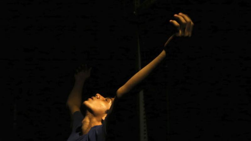 In this June 12, 2017 photo, 15-year-old ballet dancer Amiruddin Shah practices before a performance in Mumbai, India. The teenage son of a welder from a Mumbai slum has won a spot at the prestigious American Ballet Theatre's Jacqueline Kennedy Onassis School in New York. Shah was doing backflips and contemporary dance when his American Israeli instructor first discovered his talent. Now, he’s trying to raise funds to cover his training in the US. (AP Photo/Rajanish Kakade) In this June 12, 2017 photo, 15-year-old ballet dancer Amiruddin Shah practices before a performance in Mumbai, India. The teenage son of a welder from a Mumbai slum has won a spot at the prestigious American Ballet Theatre's Jacqueline Kennedy Onassis School in New York. Shah was doing backflips and contemporary dance when his American Israeli instructor first discovered his talent. Now, he’s trying to raise funds to cover his training in the US. (AP Photo/Rajanish Kakade)