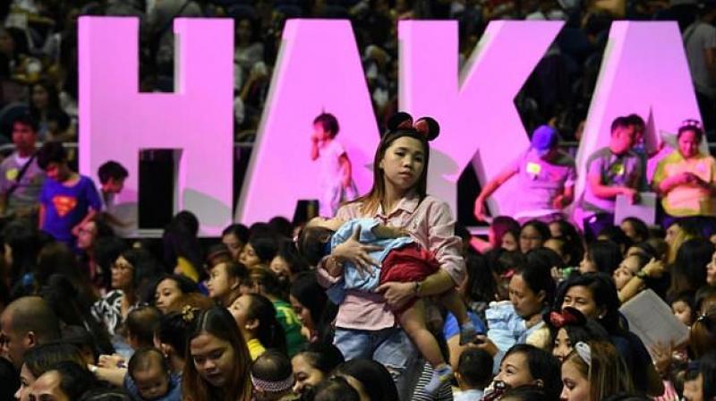 Hundreds of mothers suckled their babies inside a cavernous Manila stadium for a cause (Photo: AFP) Hundreds of mothers suckled their babies inside a cavernous Manila stadium for a cause (Photo: AFP)