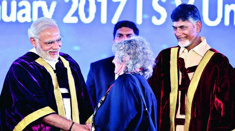 Prime Minister Narendra Modi shakes hands with Nobel laureate Ada E. Yonath during the inauguration of 104th Indian Science Congress at Sri Venkateswara University in Tirupati on Tuesday. Andhra Pradesh Chief Minister N. Chandrababu Naidu (right) is also seen. (Photo: PTI) Prime Minister Narendra Modi shakes hands with Nobel laureate Ada E. Yonath during the inauguration of 104th Indian Science Congress at Sri Venkateswara University in Tirupati on Tuesday. Andhra Pradesh Chief Minister N. Chandrababu Naidu (right) is also seen. (Photo: PTI)