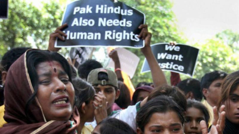 According to the South Asia Partnership-Pakistan, at least 1,000 girls mostly Hindus are forcibly converted to Islam in Pakistan every year. (Photo: PTI) According to the South Asia Partnership-Pakistan, at least 1,000 girls mostly Hindus are forcibly converted to Islam in Pakistan every year. (Photo: PTI)