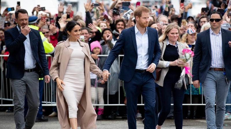 Britain's Prince Harry (C) and his wife Meghan, Duchess of Sussex (2nd L) meet well-wishers during a public walk along the Viaduct Harbour in Auckland on October 30, 2018. (Photo: AFP) Britain's Prince Harry (C) and his wife Meghan, Duchess of Sussex (2nd L) meet well-wishers during a public walk along the Viaduct Harbour in Auckland on October 30, 2018. (Photo: AFP)