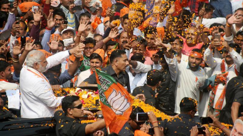 Huge crowd gathers during Prime Minister Narendra Modi's roadshow in Varanasi. (Photo: PTI) Huge crowd gathers during Prime Minister Narendra Modi's roadshow in Varanasi. (Photo: PTI)