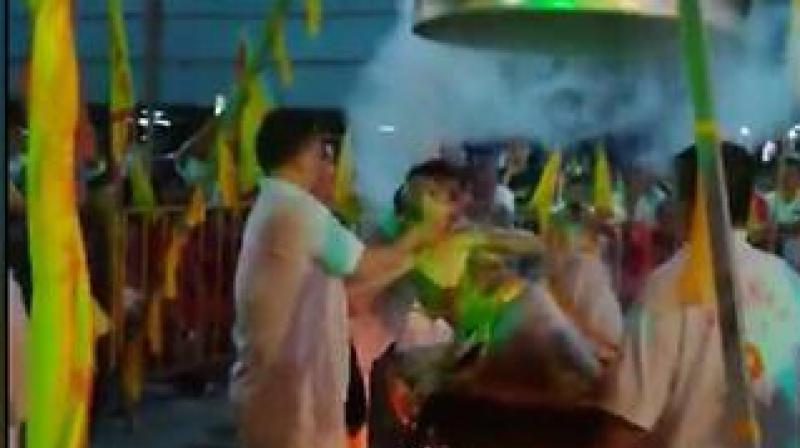 Lim Ba, 68, suffered a heart attack and burns after attempting to perform the elaborate ritual during a Taoist festival at a Chinese temple. (Photo: Video screengrab Facebook/黄民友) Lim Ba, 68, suffered a heart attack and burns after attempting to perform the elaborate ritual during a Taoist festival at a Chinese temple. (Photo: Video screengrab Facebook/黄民友)