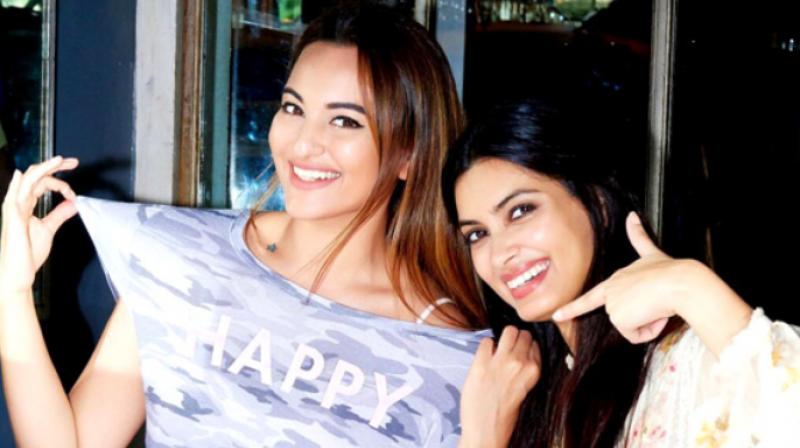 Sonakshi Sinha and Diana Penty in a photoshoot. Sonakshi Sinha and Diana Penty in a photoshoot.