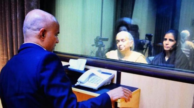 Jadhav and his family sat across divided by a glass barrier which the officials said was necessitated due to security threats. (Photo: DC) Jadhav and his family sat across divided by a glass barrier which the officials said was necessitated due to security threats. (Photo: DC)