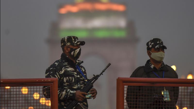 Security personnel keep vigil at Rajpath on the eve of 72nd Republic Day, in New Delhi, Monday, Jan. 25, 2021. (PTI /Kamal Singh)