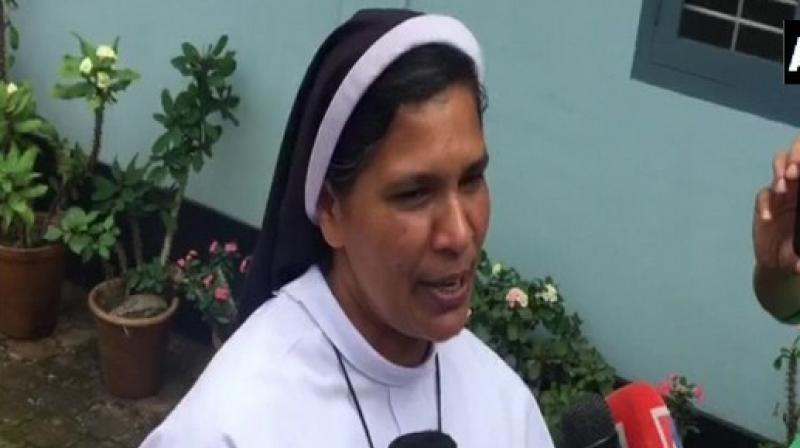 Sister Lucy, who joined a number of others outside the Kochi High Court to stage a protest against the rape-accused Bishop, was reportedly barred from her duties and relieved from church activities on Sunday. (Photo: ANI) Sister Lucy, who joined a number of others outside the Kochi High Court to stage a protest against the rape-accused Bishop, was reportedly barred from her duties and relieved from church activities on Sunday. (Photo: ANI)