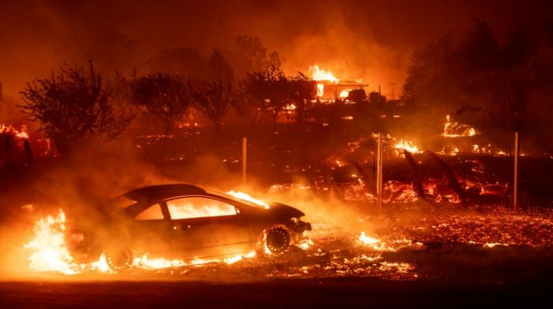 Vehicles and homes have been destroyed by the "Camp Fire" in Paradise, California. (Photo: AFP) Vehicles and homes have been destroyed by the "Camp Fire" in Paradise, California. (Photo: AFP)