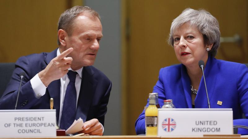British Prime Minister Theresa May, right, and European Council President Donald Tusk attend a round table meeting at an EU summit in Brussels, Sunday, Nov. 25, 2018. (Photo: AP) British Prime Minister Theresa May, right, and European Council President Donald Tusk attend a round table meeting at an EU summit in Brussels, Sunday, Nov. 25, 2018. (Photo: AP)