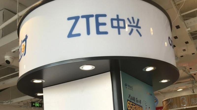 ZTE's logo is seen in a telecommunication services shop in Beijing Wednesday, July 4, 2018. Tech giant ZTE Corp.’s near-death experience after Washington barred it from buying US components was a stark reminder that China’s industry leaders cannot function without American technology. (AP Photo/Ng Han Guan) ZTE's logo is seen in a telecommunication services shop in Beijing Wednesday, July 4, 2018. Tech giant ZTE Corp.’s near-death experience after Washington barred it from buying US components was a stark reminder that China’s industry leaders cannot function without American technology. (AP Photo/Ng Han Guan)