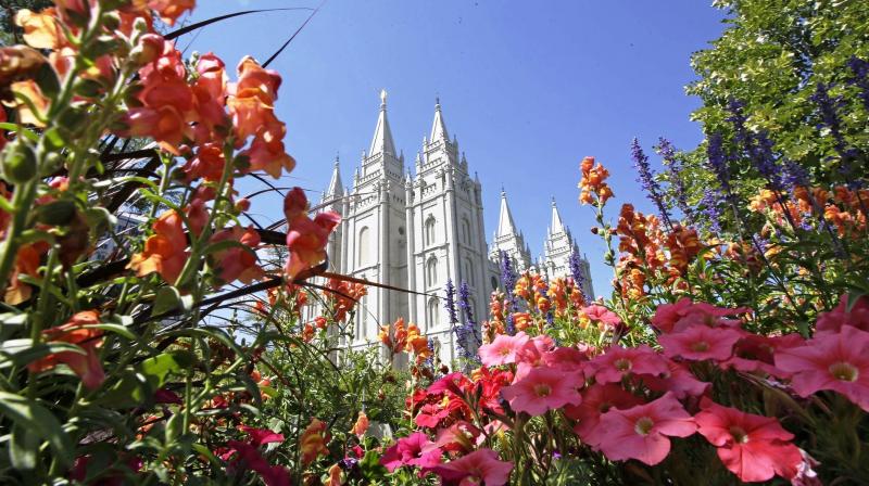 Flowers bloom in front of the Salt Lake Temple, at Temple Square, in Salt Lake City, which made surprise announcement on Thursday by reversing the rules that triggered widespread condemnations from LGBTQ members and their allies. (Photo: AP) Flowers bloom in front of the Salt Lake Temple, at Temple Square, in Salt Lake City, which made surprise announcement on Thursday by reversing the rules that triggered widespread condemnations from LGBTQ members and their allies. (Photo: AP)