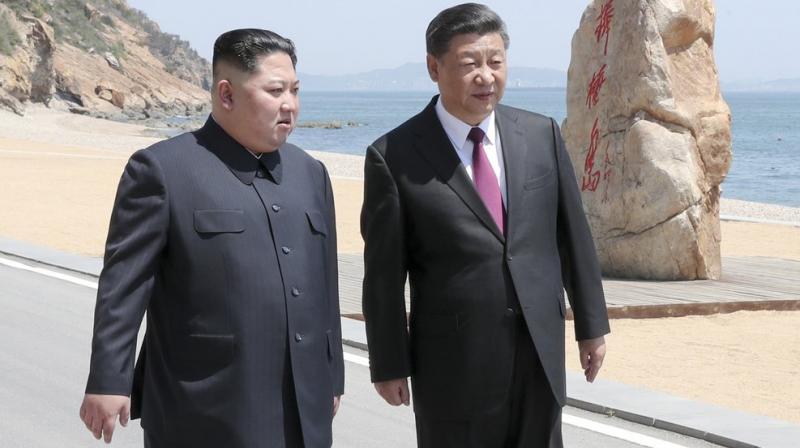 Chinese state broadcaster CCTV showed Xi and Kim taking a seaside stroll in the northeastern city of Dalian and holding talks. (Photo: @XHNews | Twitter) Chinese state broadcaster CCTV showed Xi and Kim taking a seaside stroll in the northeastern city of Dalian and holding talks. (Photo: @XHNews | Twitter)