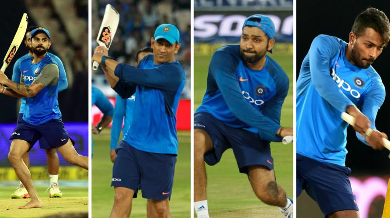 Rohit Sharma, Virat Kohli, MS Dhoni and Hardik Pandya tried their batting left-handed as the wet outfield delayed proceedings of the third and final India versus Australia Twenty20 in Hyderabad at the Rajiv Gandhi International Cricket Stadium. (Photo: PTI / BCCI) Rohit Sharma, Virat Kohli, MS Dhoni and Hardik Pandya tried their batting left-handed as the wet outfield delayed proceedings of the third and final India versus Australia Twenty20 in Hyderabad at the Rajiv Gandhi International Cricket Stadium. (Photo: PTI / BCCI)