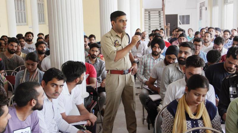 Superintendent of Police (South Jammu) Sandeep Chaudhary gives free coaching to the students preparing for various examinations including Civil Services. (Photo: PTI) Superintendent of Police (South Jammu) Sandeep Chaudhary gives free coaching to the students preparing for various examinations including Civil Services. (Photo: PTI)