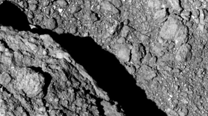 Japan space agency scientists and engineers are thrilled by the images being sent to Earth by two jumping robotic rovers that they dropped onto an asteroid about 280 million kilometers (170 million miles) away. (Photo: AP) Japan space agency scientists and engineers are thrilled by the images being sent to Earth by two jumping robotic rovers that they dropped onto an asteroid about 280 million kilometers (170 million miles) away. (Photo: AP)
