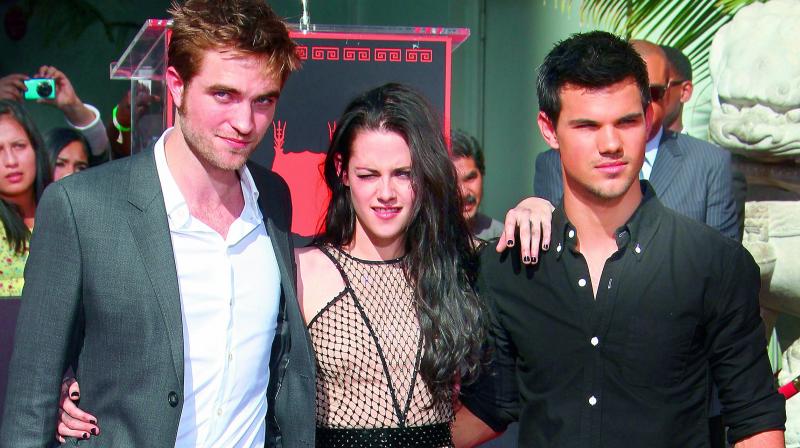 Twilight actors — Kristen Stewart, Robert Pattinson, and Taylor Lautner Twilight actors — Kristen Stewart, Robert Pattinson, and Taylor Lautner