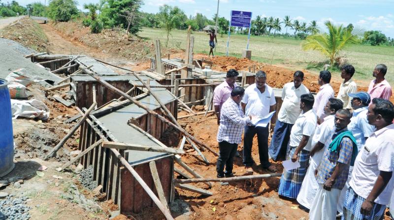 Kudimaramathu works going on at Raramuthirakottai village in Papanasam taluk on Thursday. (Photo: DC) Kudimaramathu works going on at Raramuthirakottai village in Papanasam taluk on Thursday. (Photo: DC)