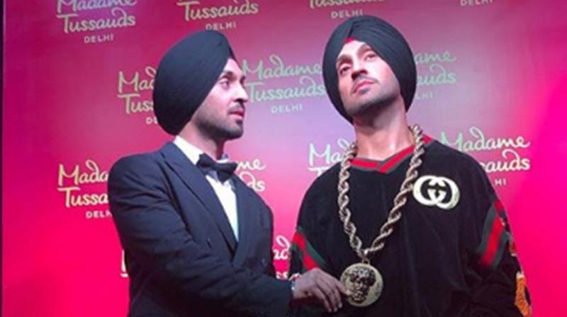 Diljit Dosanjh with his wax statue. (Photo: Instagram) Diljit Dosanjh with his wax statue. (Photo: Instagram)