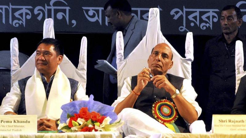 Arunachal Pradesh CM Pema Khandu, Union Home Minister Rajnath Singh and Manipur BJP President K Bhabananda Singh in Imphal on Sunday. (Photo: PTI) Arunachal Pradesh CM Pema Khandu, Union Home Minister Rajnath Singh and Manipur BJP President K Bhabananda Singh in Imphal on Sunday. (Photo: PTI)