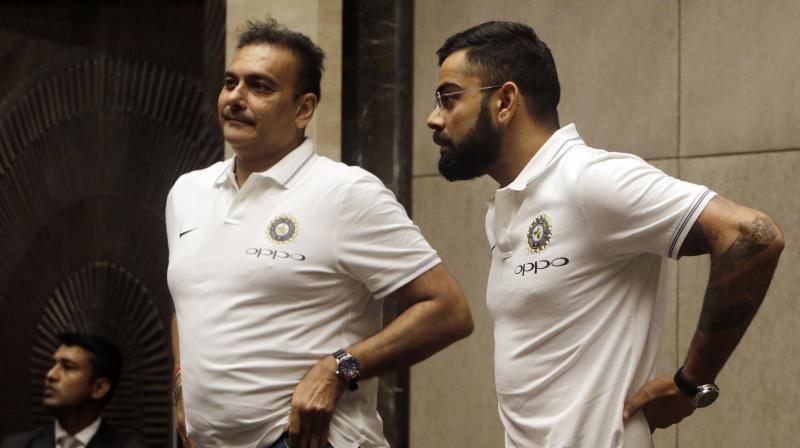 Virat Kohli was quick to point out that his side has already worked with Ravi Shastri. (Photo: AP) Virat Kohli was quick to point out that his side has already worked with Ravi Shastri. (Photo: AP)