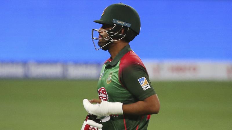 A couple of hours after being told by doctors that his Asia Cup was over because of a fractured left wrist, Tamim walked out to bat with one hand after the fall of ninth wicket. (Photo: AP) A couple of hours after being told by doctors that his Asia Cup was over because of a fractured left wrist, Tamim walked out to bat with one hand after the fall of ninth wicket. (Photo: AP)