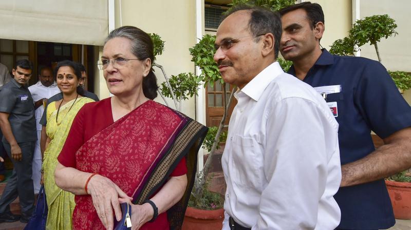UPA chairperson Sonia Gandhi with Congress MP Adhir Ranjan Chowdhury in New Delhi on Tuesday.(Photo: AP) UPA chairperson Sonia Gandhi with Congress MP Adhir Ranjan Chowdhury in New Delhi on Tuesday.(Photo: AP)
